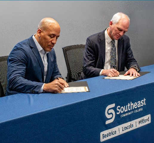 Rob Jeffreys and Dr. Paul Illich sign Memorandum of Understanding. 